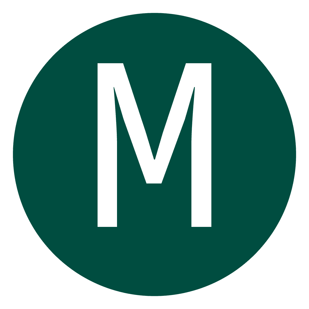 A green circle with the letter m in it.