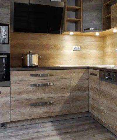 A kitchen with wooden cabinets and floors